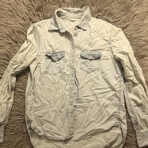 Light blue button up long sleeved shirt